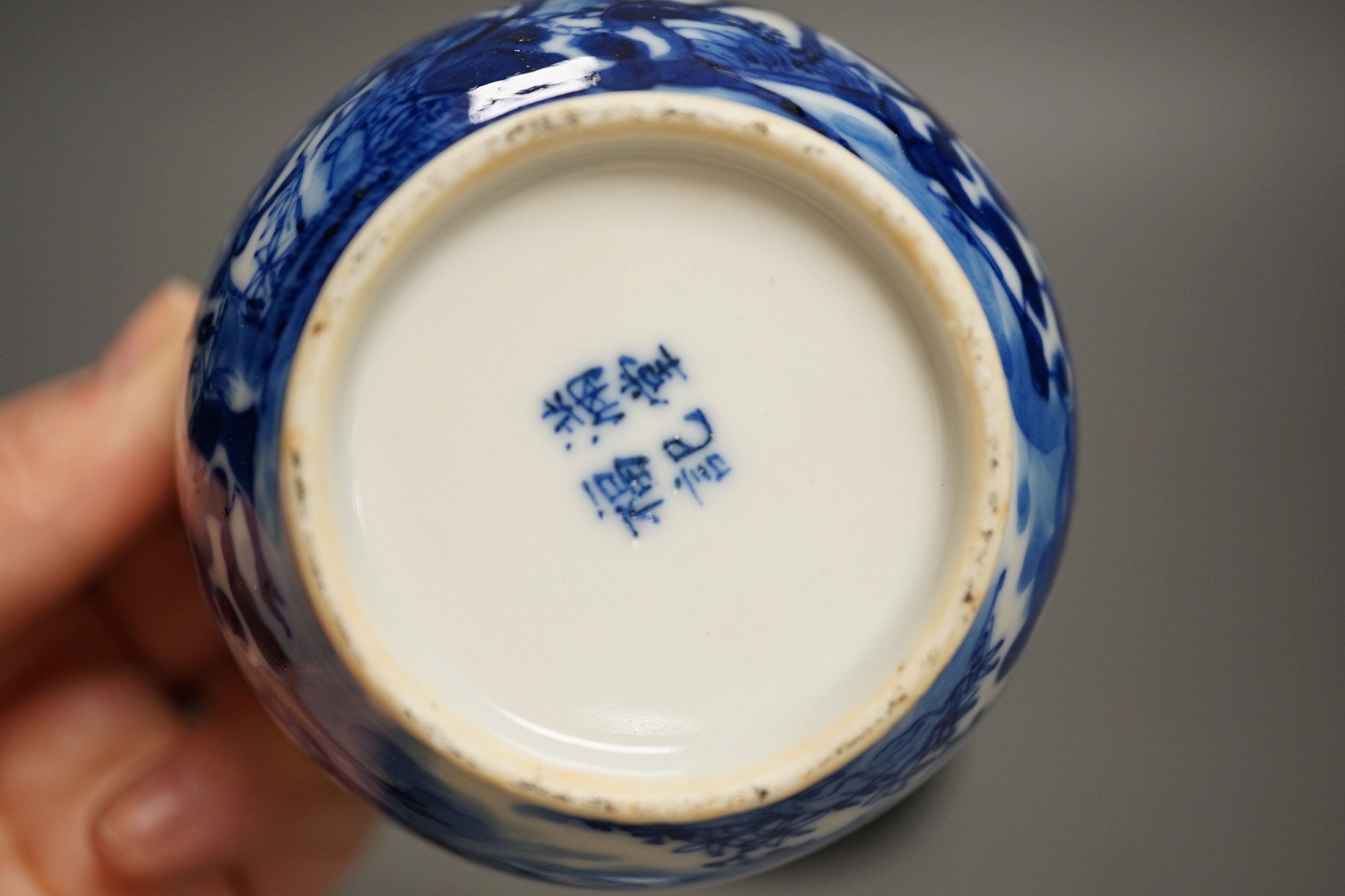 A 19th century Chinese blue and white ‘eight deer’ bowl and cover, ‘man tang fu ji’ mark, 12cm excluding wood stand